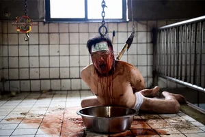 Man in Bloody Torture Scene